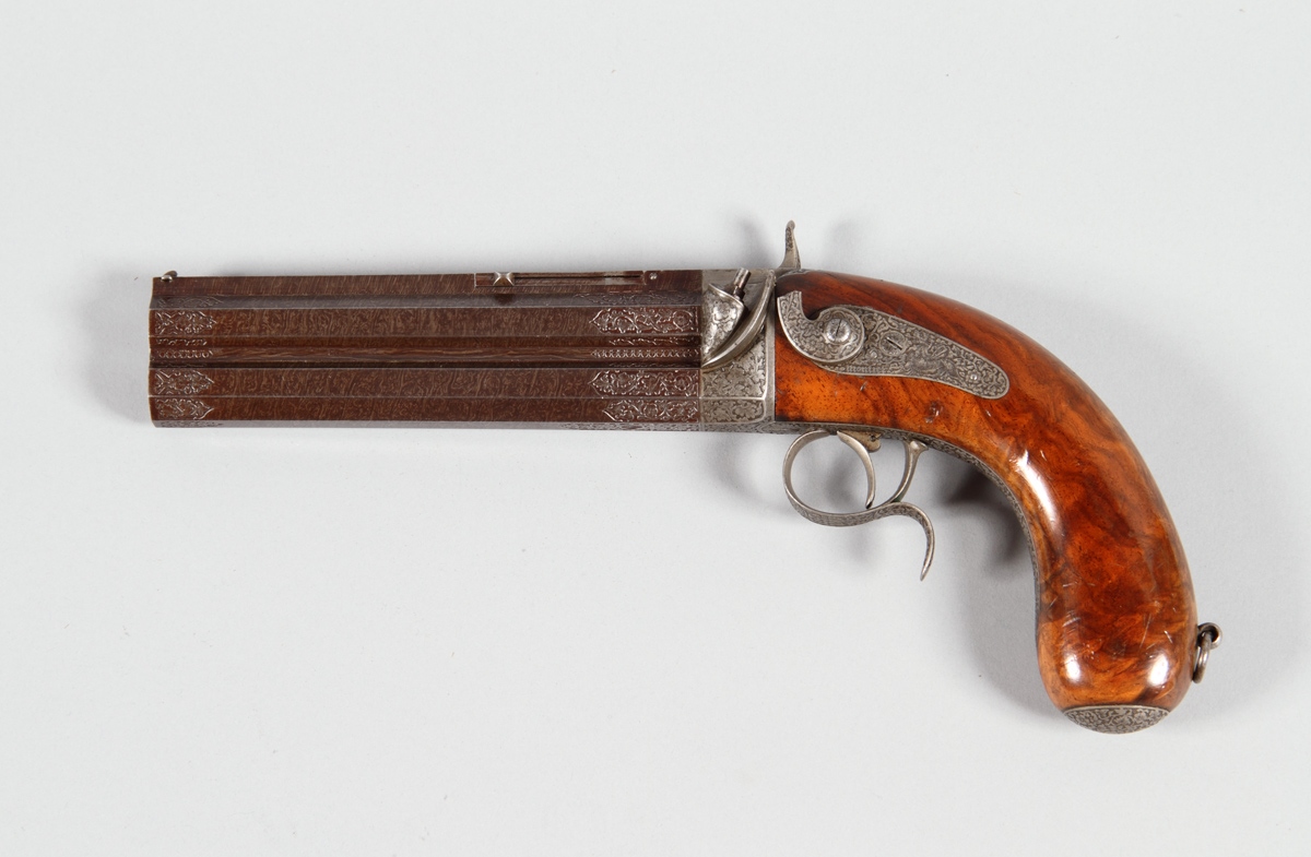 Pistolet damasquiné à canons superposés