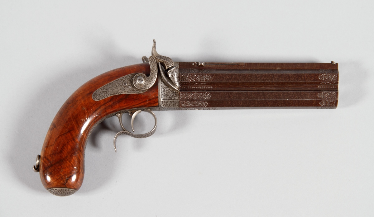 Pistolet damasquiné à canons superposés
