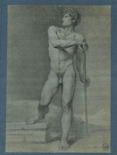 Etude de nu, debout, le bras droit plié sur la poitrine agrippe un bâton que tient également la main gauche le bras tendu vers le bas, jambe droite pliée reposant sur une pierre debout de face, le visage tourné vers la gauche