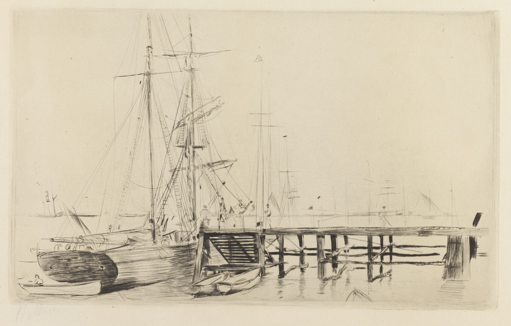 Voilier à deux mâts amarré près d'une estacade à Cowes