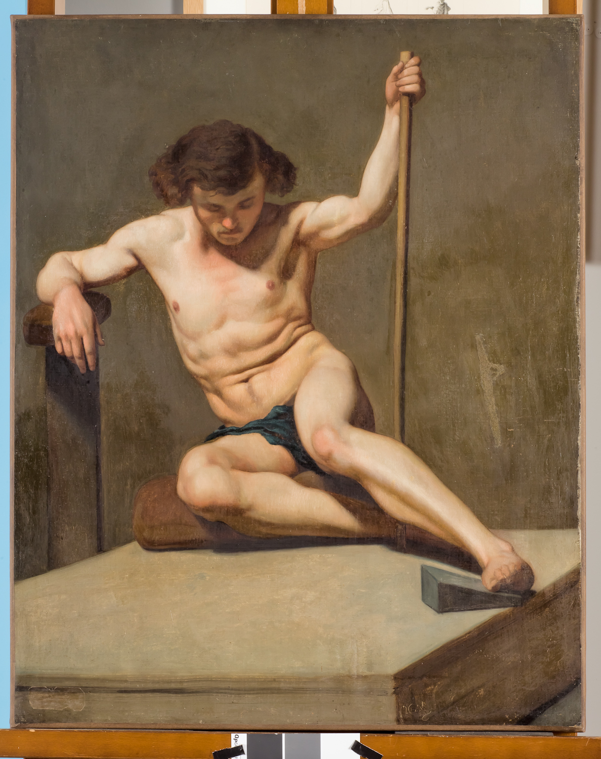 Académie d'homme accroupi