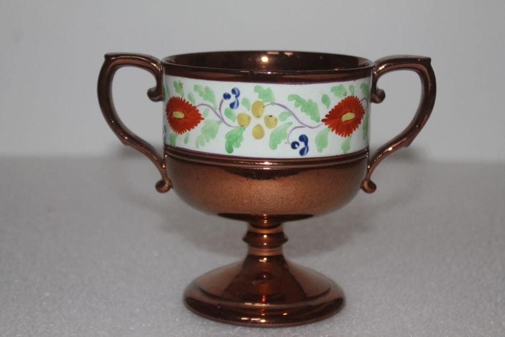 Coupe double anse dite en faïence de Jersey