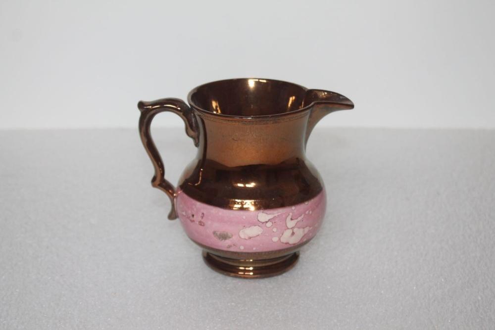 Pot à lait ou à vin dit en faïence de Jersey