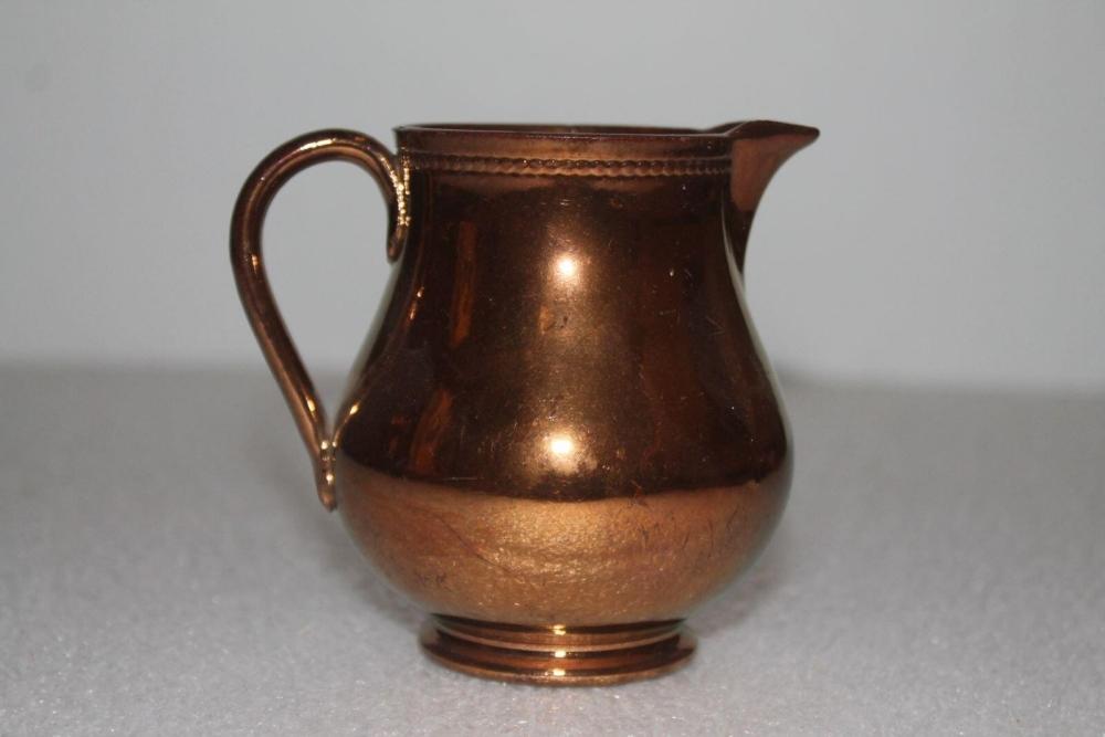 Petit pot doré dit en faïence de Jersey