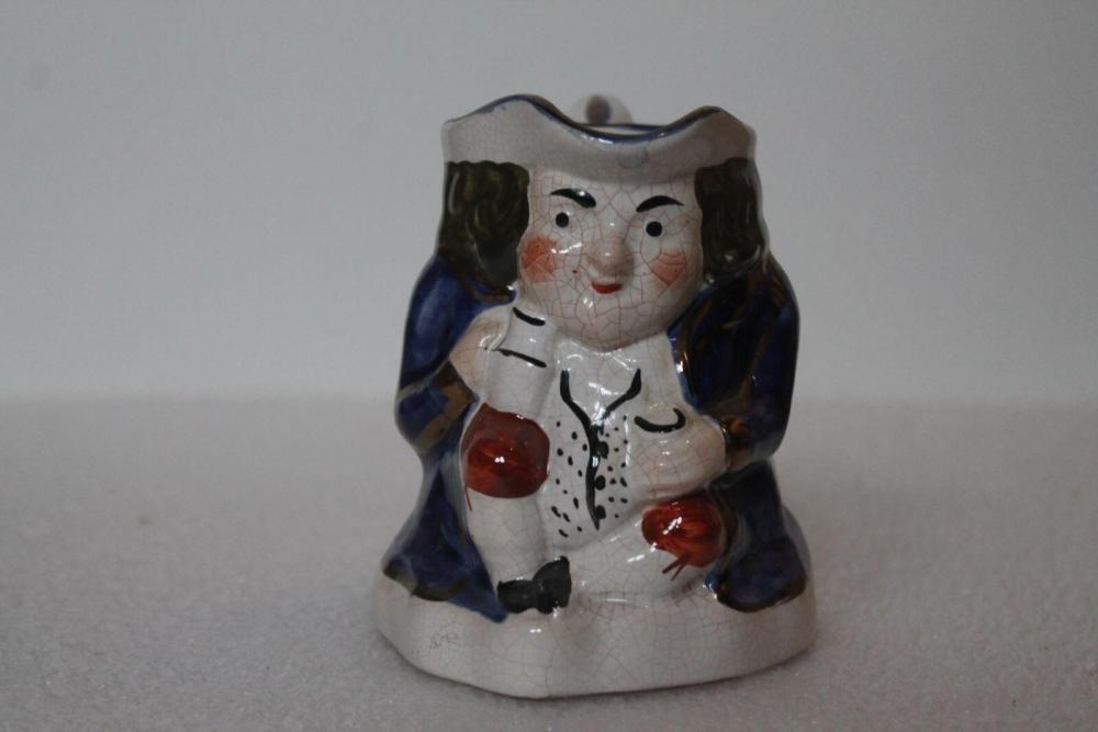 Pichet bonhomme dit en faïence de Jersey