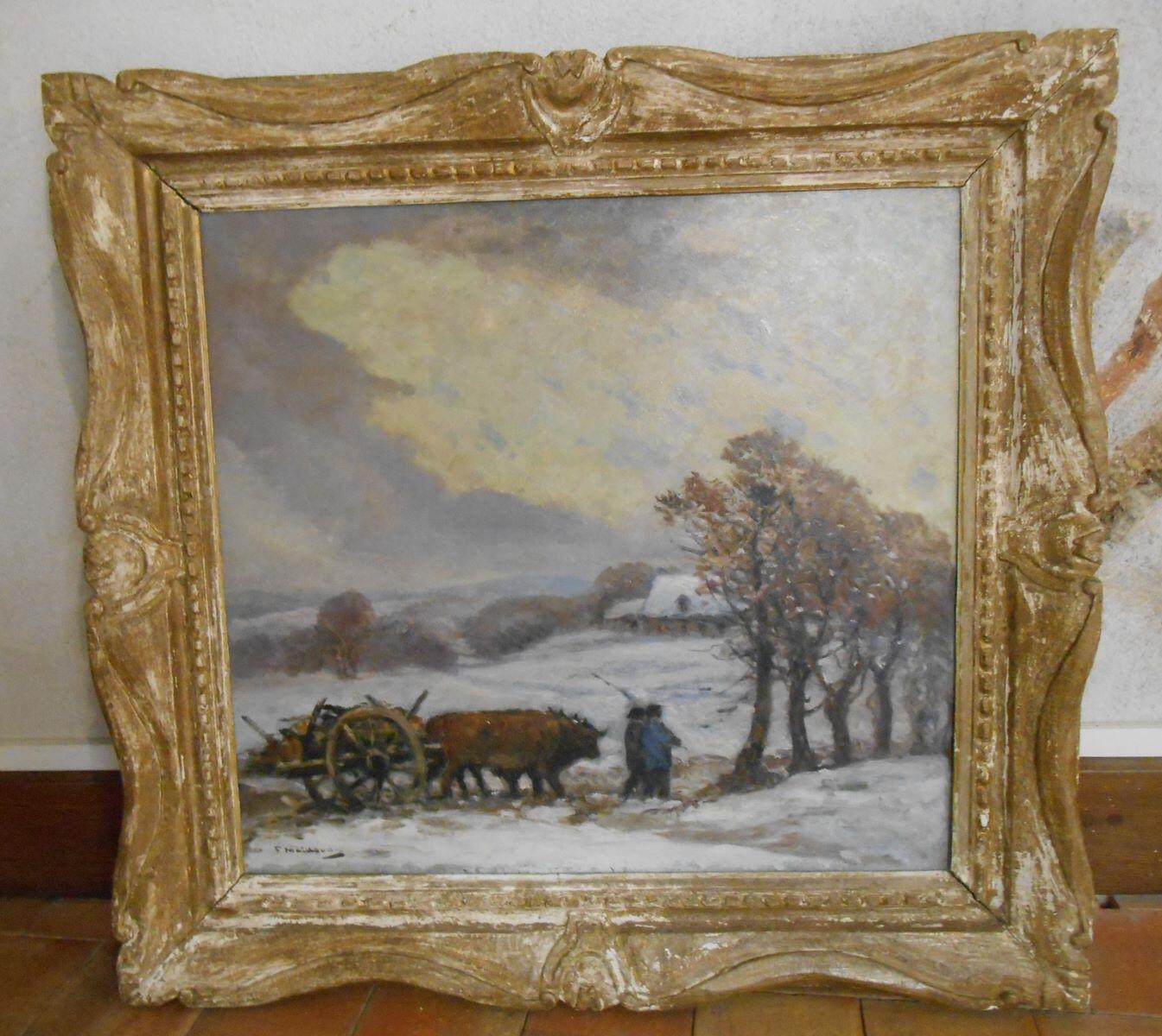 Corvée de bois dans un paysage hivernal