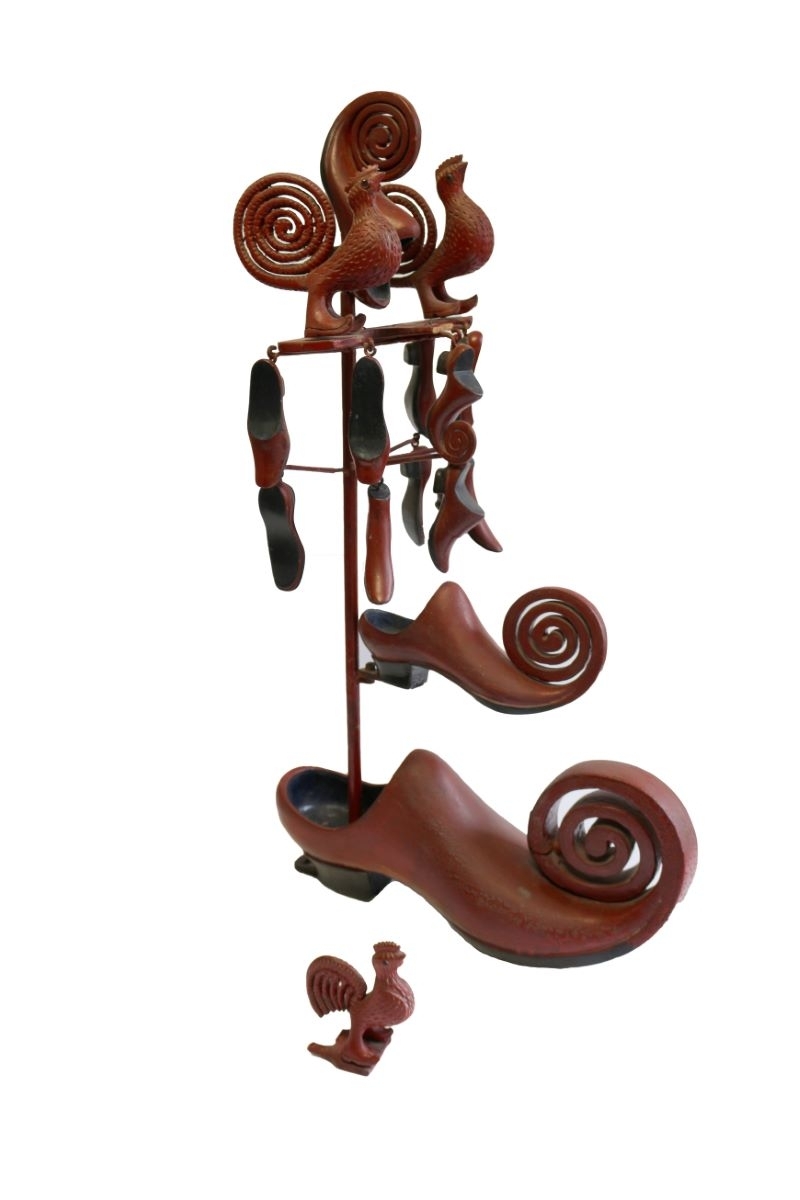 Grande enseigne de la boutique de Louis Touzet