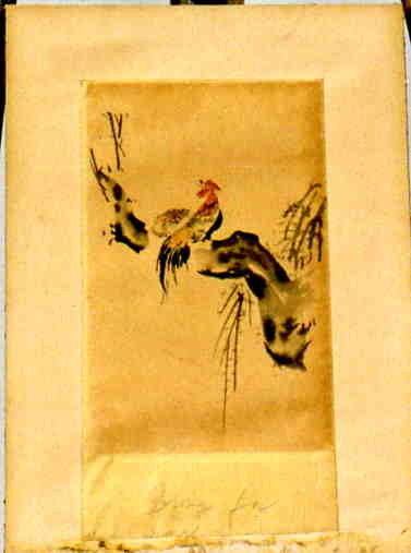 Coq et poule sur une branche