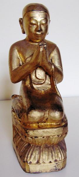 Orant agenouillé sur un trône de lotus