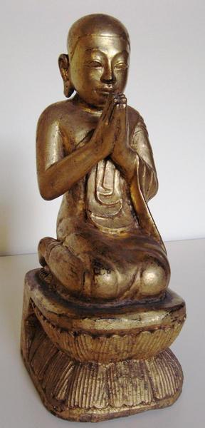 Orant agenouillé sur un trône de lotus