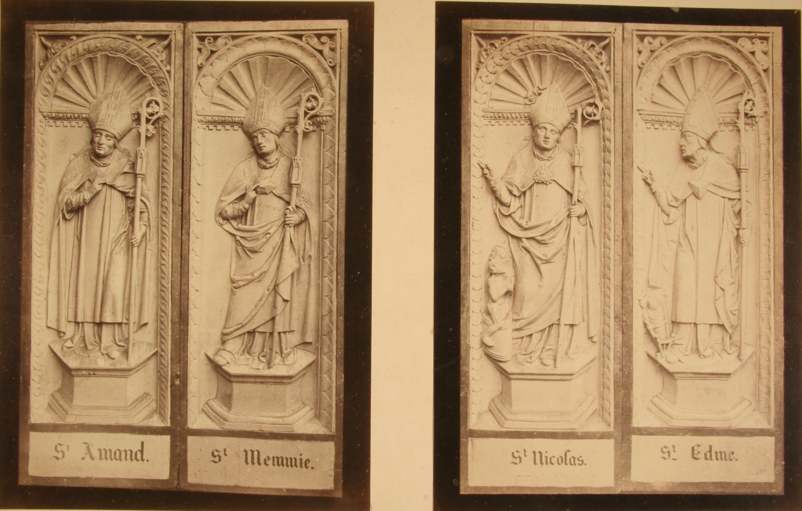 Saint-Amand et Saint-Memmie dans une niche à coquille. Saint-Nicolas et Saint-Edme dans une niche à coquille