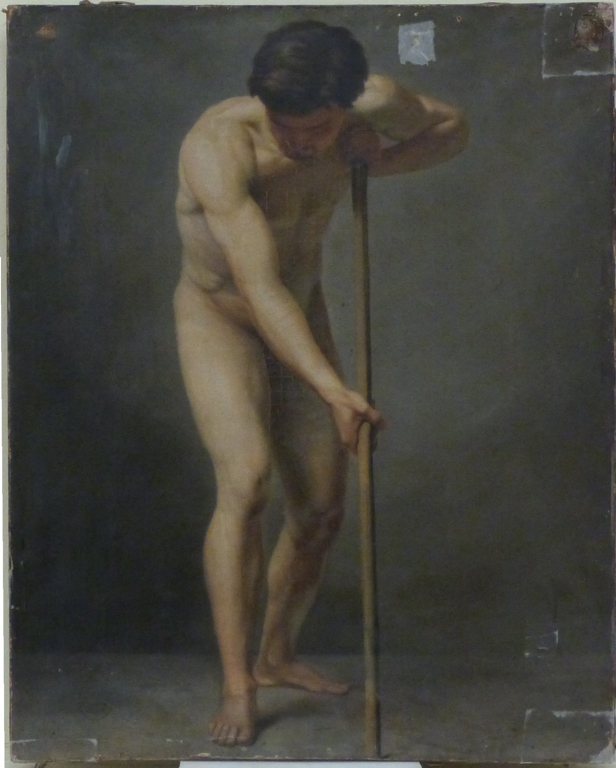 Académie d'homme tenant un bâton