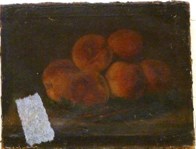 Un panier de pêches