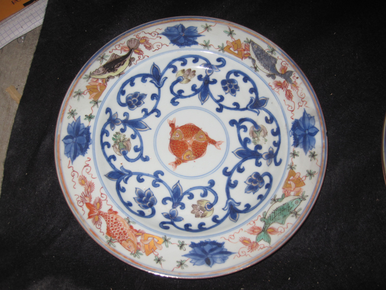 Huit assiettes en porcelaine, dites de la "Compagnie des Indes", décor Imari