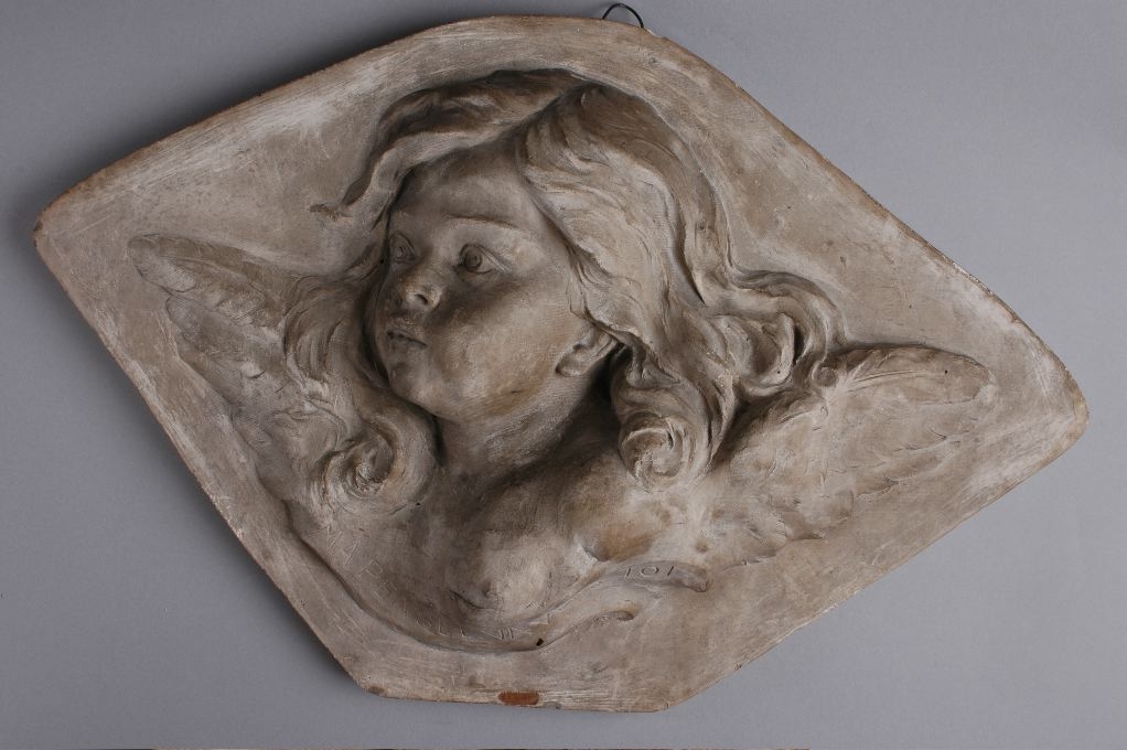 Tête d’ange (plaque funéraire)