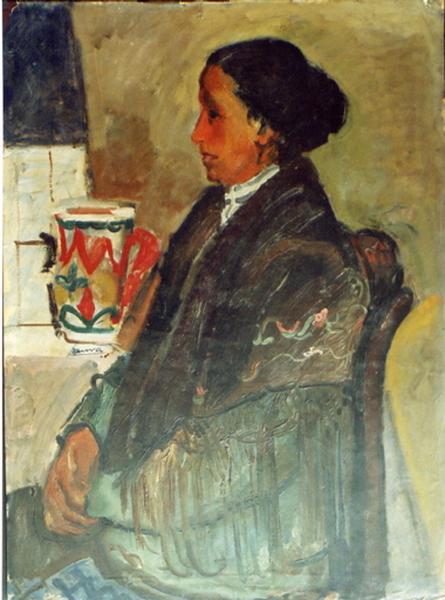Femme assise de profil au châle espagnol