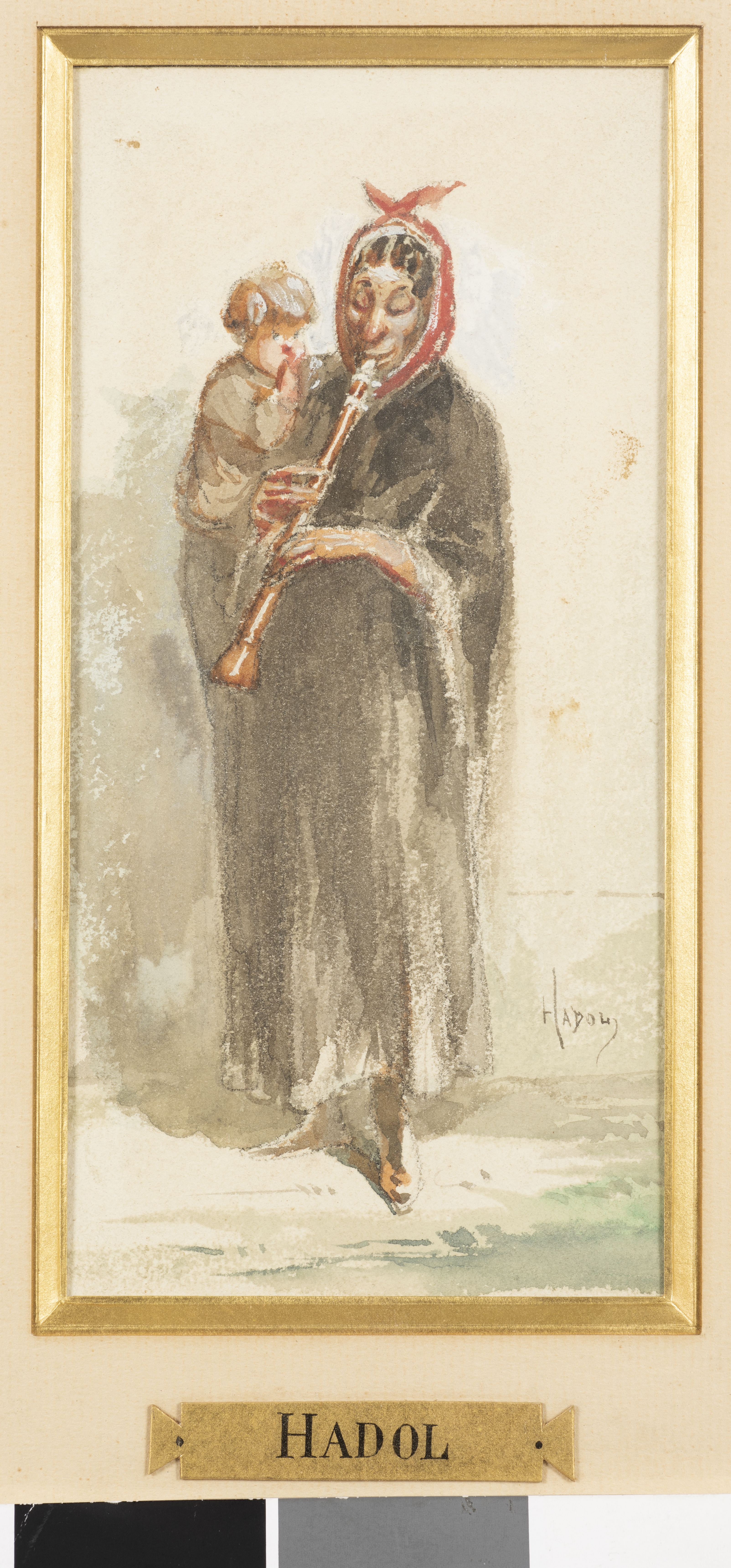 Femme jouant de la clarinette avec un enfant sur le bras gauche