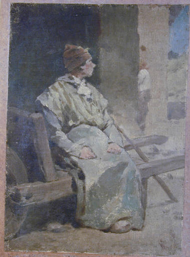 Femme assise sur une brouette