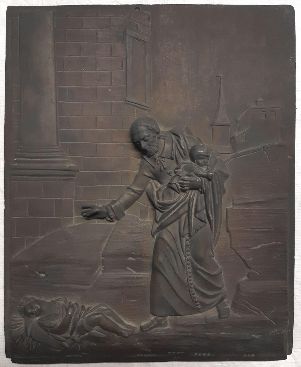 Plaquette en bronze moulé représentant saint Vincent de Paul recueillant deux enfants