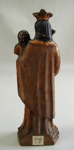 Statuette en terre cuite peinte et dorée représentant la Vierge à l'Enfant