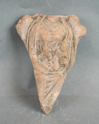 Statuette de divinité tenant un enfant dans ses bras