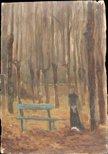 Femme en noir dans un sous-bois