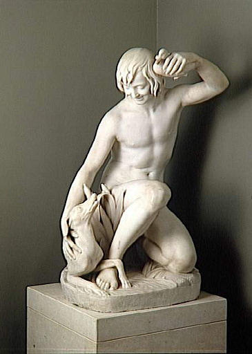 Jeune baigneur jouant avec son chien