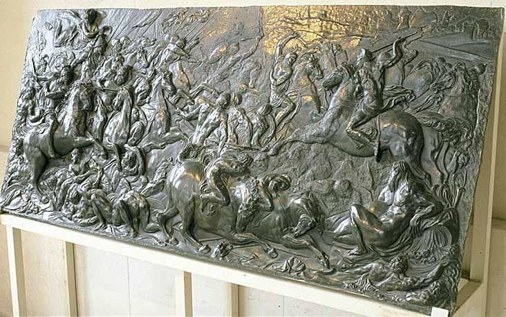 Génie appuyé sur un casque, tenant une corne d'abondance, la lettre H et deux sceptres de France et de Navarre, buste tourné vers la droite